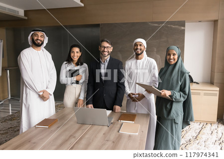 Happy Arabian and European businesspeople group portrait 117974341