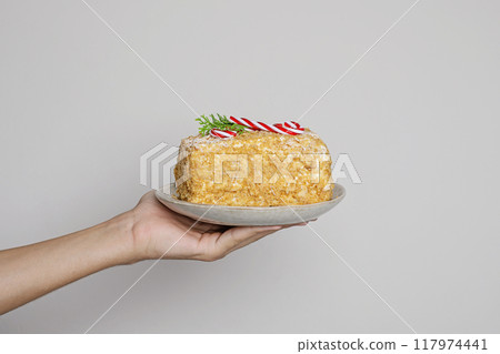 Christmas cake with red candy on white background with copy space 117974441