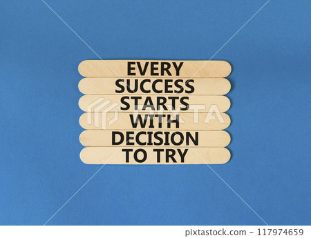 Success symbol. Concept words Every success starts with decision to try on wooden stick. Beautiful blue table blue background. Business success and decision to try concept. Copy space. 117974659