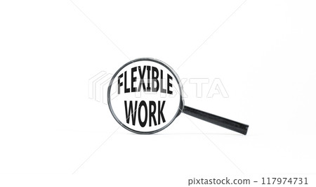 Flexible work symbol. Concept words Flexible work in beautiful magnifying glass. Beautiful white paper background. Business Flexible work concept. Copy space. 117974731