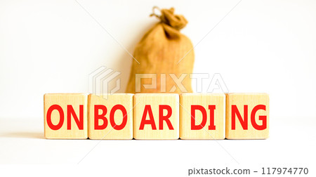 Onboarding success symbol. Concept word Onboarding on wooden blocks. Beautiful white background. Beautiful canvas bag. Business onboarding success concept. Copy space. 117974770