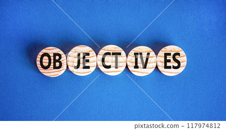 Objectives symbol. Concept word Objectives on beautiful wooden circles. Beautiful blue background. Business objectives concept. Copy space. Objectives symbol. Concept word Objectives on beautiful wooden circles. Beautiful blue background. Business objectives concept. Copy space. 117974812