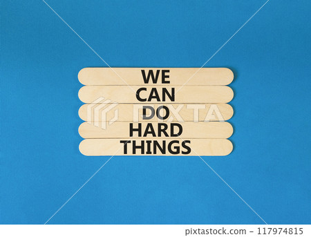 We can do hard things symbol. Concept words We can do hard things on wooden stick. Beautiful blue table blue background. Business, we can do hard things concept. Copy space. We can do hard things symbol. Concept words We can do hard things on wooden stick. Beautiful blue table blue background. Business, we can do hard things concept. Copy space. 117974815