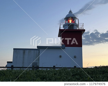 Illuminated Hanasaki Lighthouse in the evening 117974976