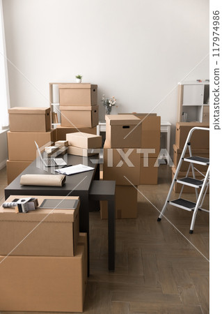Vertical shot of stockroom filled with cardboard boxes 117974986