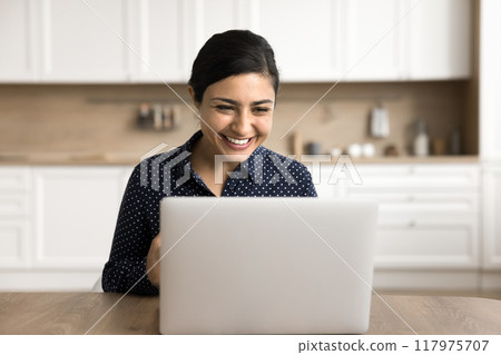 Woman using laptop read e-mail, enjoy good news in notification Woman using laptop read e-mail, enjoy good news in notification 117975707