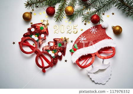 Abstract background of Christmas attributes with the year number 2025. Abstract background of Christmas attributes with the year number 2025. 117976332