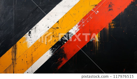 Striking diagonal stripes of orange, yellow, white, and black paint on a worn surface 117976515