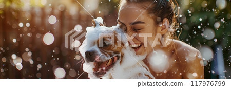 The vibrant garden scene captures a young woman's laughter as she bathes her sudsy dog, highlighting the playful, loving, and relaxed atmosphere of summertime pet grooming and bonding, banner The vibrant garden scene captures a young woman's laughter as she bathes her sudsy dog, highlighting the playful, loving, and relaxed atmosphere of summertime pet grooming and bonding, banner 117976799