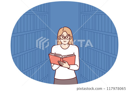 Woman is reading book in library, among shelves with textbooks and looking for right encyclopedia 117978065