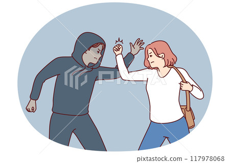 Strong woman fights back against thief by showing self-defense techniques to offender man Strong woman fights back against thief by showing self-defense techniques to offender man 117978068