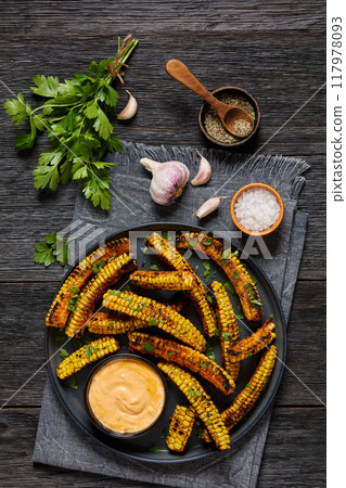 bbq corn ribs on a plate, top view 117978093