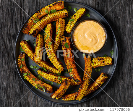 bbq corn ribs on a plate, top view 117978096