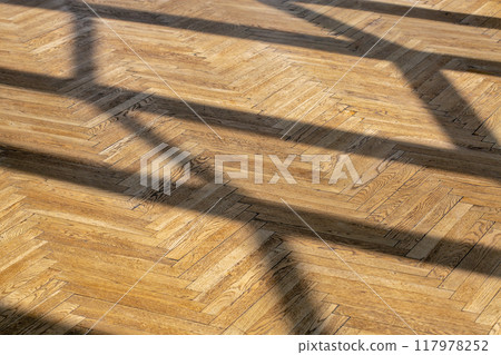 Abstract background with straight shadows on old wooden parquet. 117978252