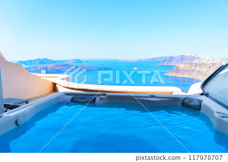 Pool and view of Santorini caldera 117978707