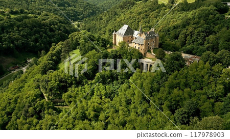 Aerial shot of Chateau d'Uriage, a historic castle in Saint-Martin-d'Uriage, an official monument in France. Aerial shot of Chateau d'Uriage, a historic castle in Saint-Martin-d'Uriage, an official monument in France. 117978903