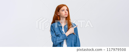 So pity. Upset gloomy cute redhead female student lost her chance participate exchange program, sobbing and looking grumpy pointing upper left corner, express regret and disappointment So pity. Upset gloomy cute redhead female student lost her chance participate exchange program, sobbing and looking grumpy pointing upper left corner, express regret and disappointment 117979508
