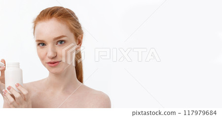 Beautiful Smiling Girl Taking Medication, Holding Bottle With Pills. Healthy Happy Female Eating Pill. Vitamins And Supplements,Diet Nutrition Concept Beautiful Smiling Girl Taking Medication, Holding Bottle With Pills. Healthy Happy Female Eating Pill. Vitamins And Supplements,Diet Nutrition Concept 117979684