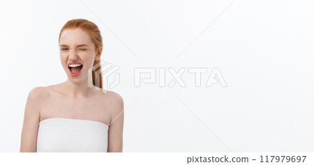 Portrait of young woman with shocked facial expression. Portrait of young woman with shocked facial expression. 117979697
