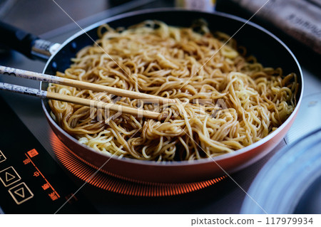 Frying Yakisoba noodles Frying Yakisoba noodles 117979934