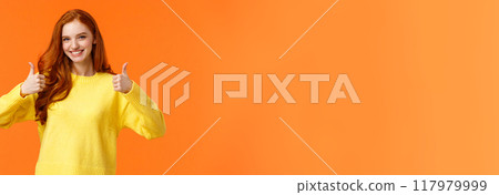 Confident and caring good-looking redhead sister rooting for sibling, saying yes, approving choice, recommend product, show thumbs-up and nod acceptance, smiling positive reply, orange wall Confident and caring good-looking redhead sister rooting for sibling, saying yes, approving choice, recommend product, show thumbs-up and nod acceptance, smiling positive reply, orange wall 117979999