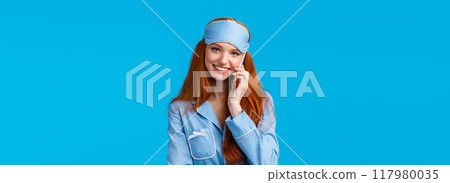 No you hang first. Lovely and beautiful redhead girlfriend talking phone till midnight, wearing sleep mask and nightwear, holding smartphone, calling boyfriend smiling silly, blue background No you hang first. Lovely and beautiful redhead girlfriend talking phone till midnight, wearing sleep mask and nightwear, holding smartphone, calling boyfriend smiling silly, blue background 117980035