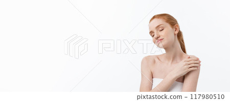 Beauty Woman. Beautiful Young Female touching Her Skin. Portrait isolated on White Background. Healthcare. Perfect Skin. Beauty Face Beauty Woman. Beautiful Young Female touching Her Skin. Portrait isolated on White Background. Healthcare. Perfect Skin. Beauty Face 117980510