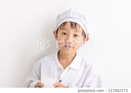 Boy drinking milk Boy drinking milk 117982573