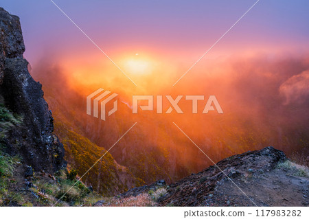 Mountains on sunset covered in fog and clouds. Madeira island, Portugal 117983282