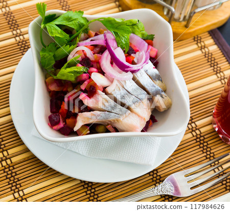 Vinaigrette salad with salted herring. Russian dish Vinaigrette salad with salted herring. Russian dish 117984626