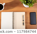Smartphone, coffee and notebook on the table 117984744