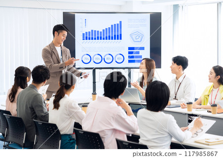 Male and female engineers having a meeting Male and female engineers having a meeting 117985867