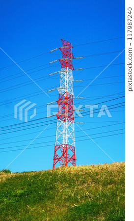 Landscape of steel tower, power line and blue sky 117987240