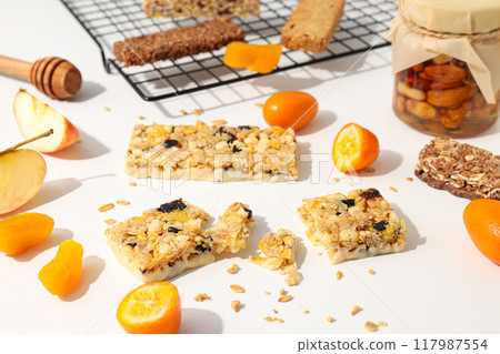 Granola Bars with dried apricots, honey with nuts and fruits Granola Bars with dried apricots, honey with nuts and fruits 117987554