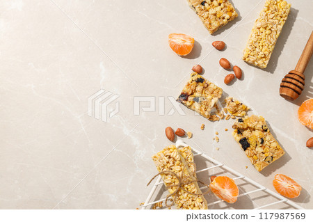 Granola Bars with nuts and fresh tangerine 117987569