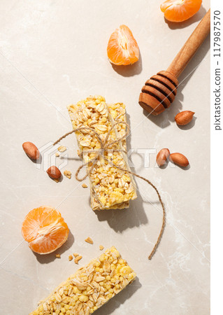Granola Bars with nuts and fresh tangerine 117987570