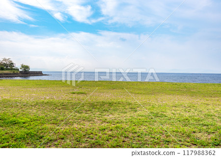 A grassy park along the shores of Lake Biwa A grassy park along the shores of Lake Biwa 117988362