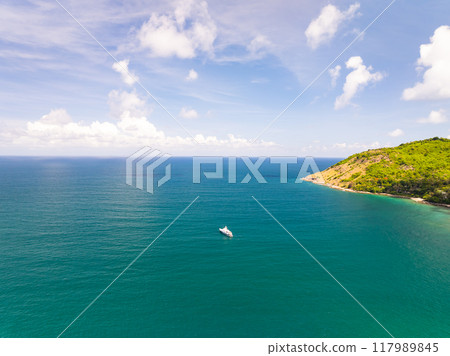 Drone view Beautiful clouds blue sky over sea in high season at Phuket Thailand Drone view Beautiful clouds blue sky over sea in high season at Phuket Thailand 117989845