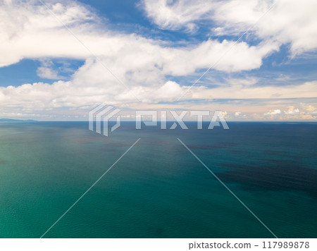 Drone view Beautiful clouds blue sky over sea in high season at Phuket Thailand Drone view Beautiful clouds blue sky over sea in high season at Phuket Thailand 117989878