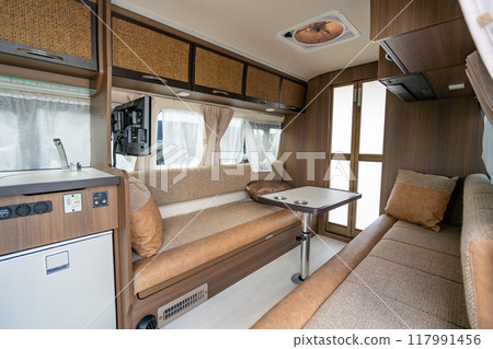 Camper van, van life, travel, sleeping in a car, temporary shelter in case of disaster, facing sofa 117991456