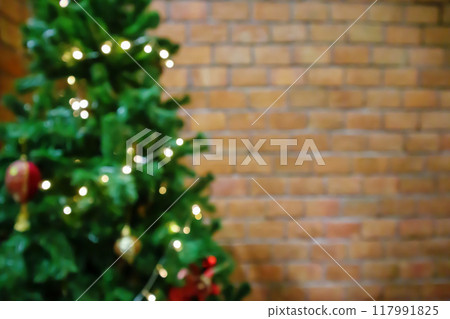 Abstract blur decorated Christmas tree with baubles New Year holidays background Abstract blur decorated Christmas tree with baubles New Year holidays background 117991825