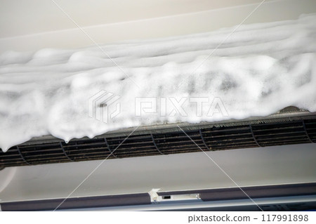air conditioner cleaning with spray foam cleaner 117991898