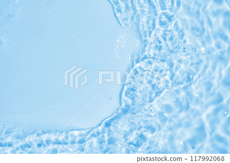 Abstract transparent water shadow surface texture natural ripple on blue background 117992068