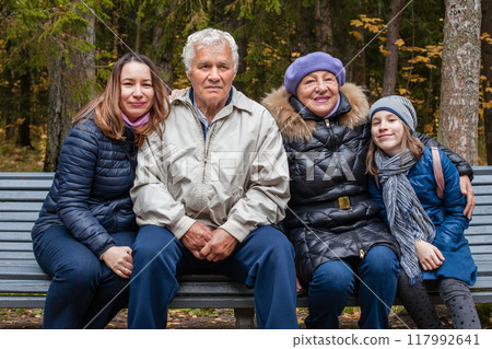 Portrait of a large family of different generations in autumn park 117992641
