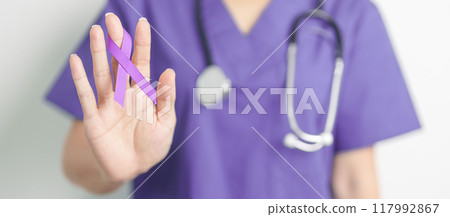 Doctor holding purple Ribbon for Violence, Pancreatic, Esophageal, Testicular cancer, Alzheimer, epilepsy, lupus, Sarcoidosis and Fibromyalgia. Awareness month and World cancer day concept 117992867