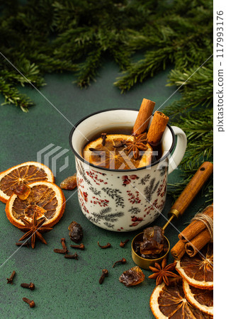 Tea in a mug on winter background Tea in a mug on winter background 117993176