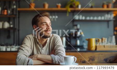 Man relaxing at a coffee shop 117993479