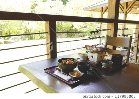 Enjoy Hida local cuisine, Keichan Donburi and Hida beef with Hoba miso on the terrace Enjoy Hida local cuisine, Keichan Donburi and Hida beef with Hoba miso on the terrace 117993803