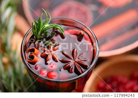 Hot Christmas drink - mulled wine in glass Hot Christmas drink - mulled wine in glass 117994243