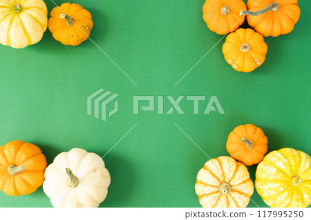 Halloween scene on orange background 117995250